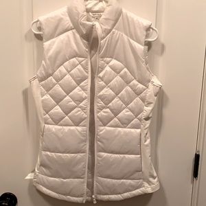 Med winter white quilted zip-front vest. Side pockets. Well made. Like new.